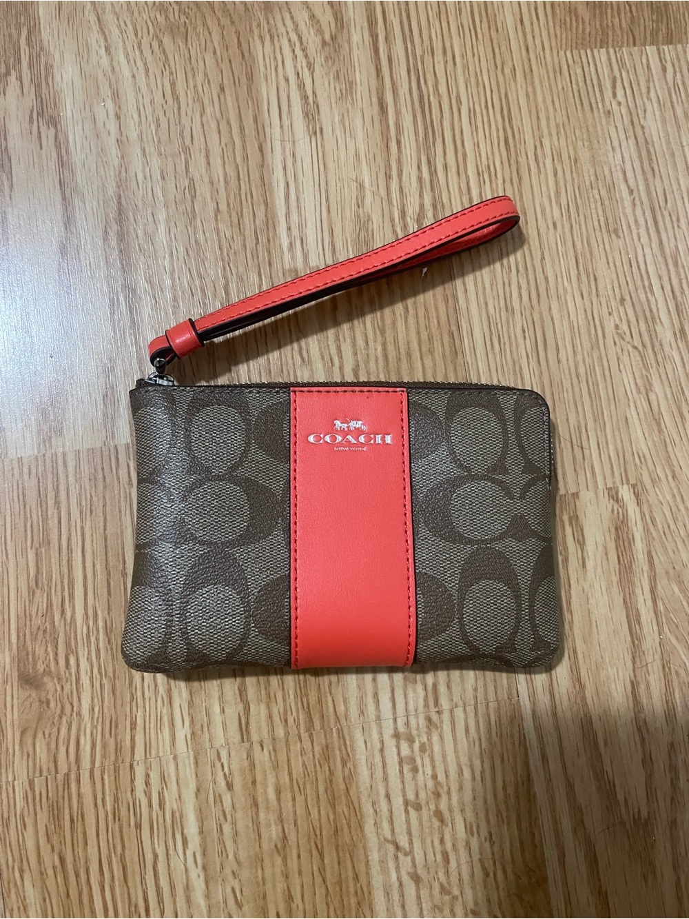 Coach Brown Signature Canvas Wristlet with Coral Stripe